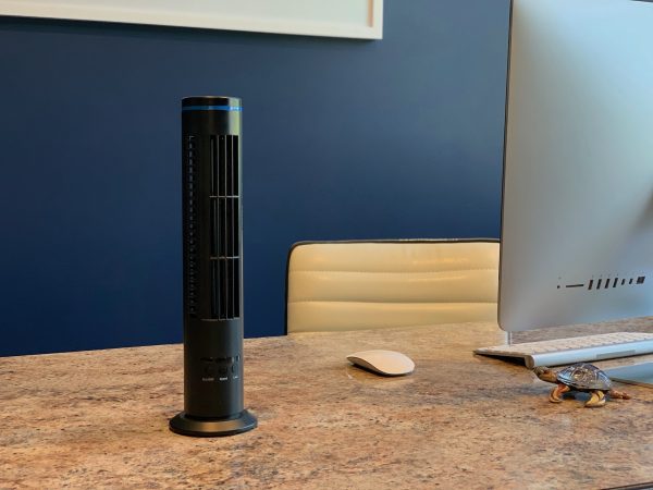 Ion Tower Max air purifier on desktop next to computer